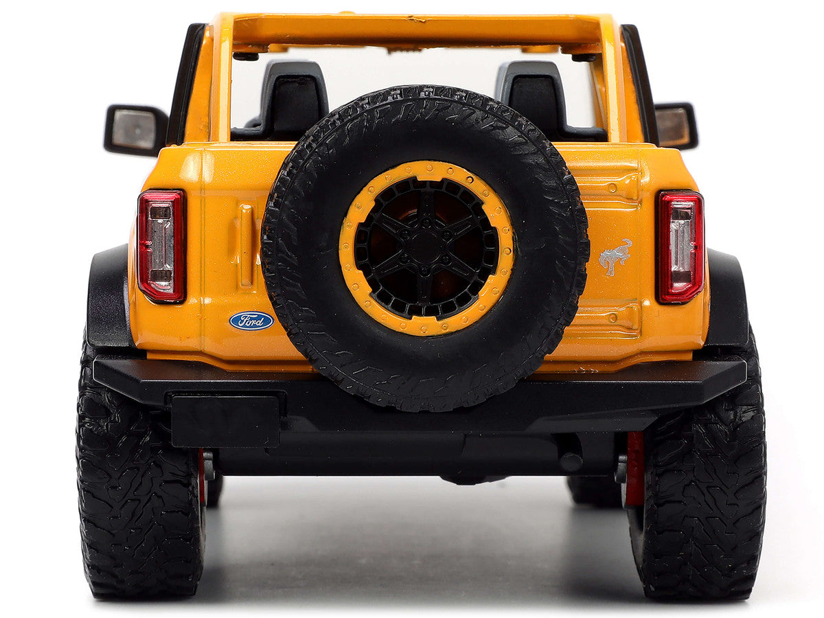2021 Ford Bronco Orange Metallic with Extra Wheels "Just Trucks" Series 1/24 Diecast Model Car by Jada Jada
