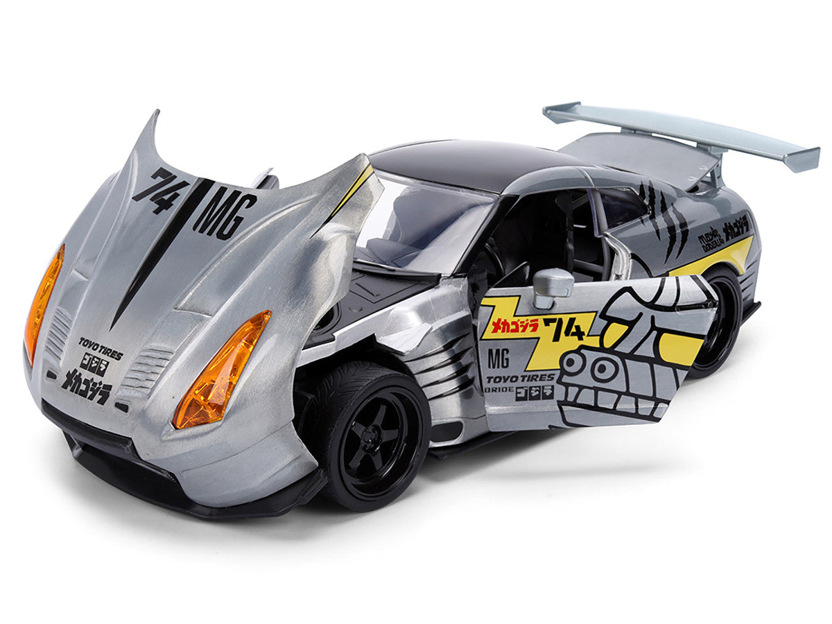 2009 Nissan GT-R (R35) Ben Sopra Brushed Metal with Black Top and Graphics and Mechagodzilla Diecast Figure "Godzilla" Franchise "Anime Hollywood Rides" Series 1/24 Diecast Model by Jada Jada