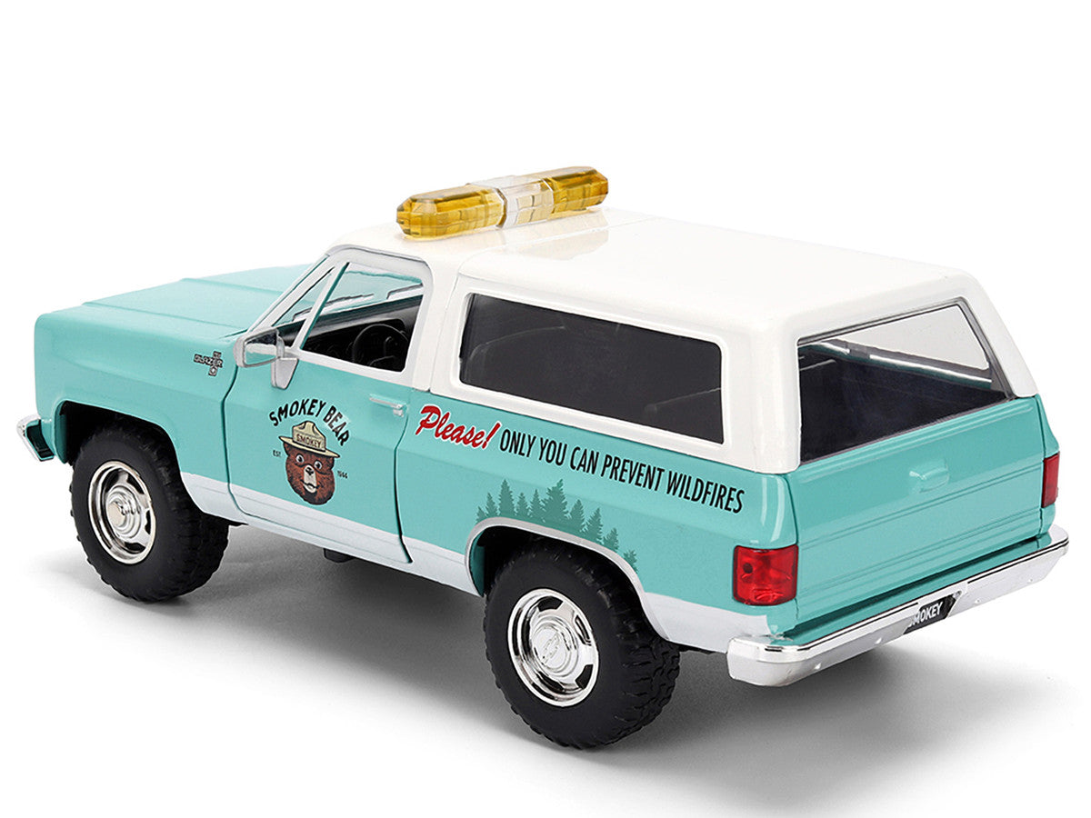 1980 Chevrolet Blazer Light Green with White Top and Graphics and Smokey Bear Diecast Figure "Smokey Bear" "Hollywood Rides" Series 1/24 Diecast Model by Jada Jada