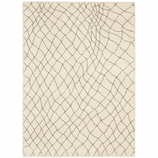 5' X 7' Ivory And Grey Geometric Power Loom Stain Resistant Area Rug