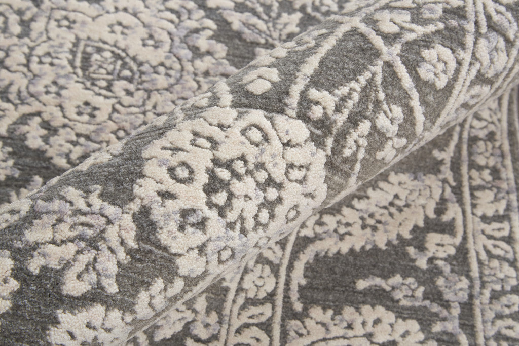 6' Taupe And Ivory Round Floral Power Loom Area Rug