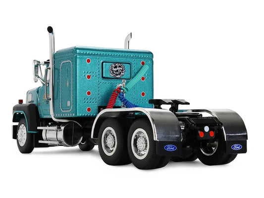 Ford LTL 9000 with 48" Flat Top Sleeper and 53' Utility Trailer with Reefer "Red’s Favorites - Tom Sercombe" Turquoise Metallic 1/64 Diecast Model by First Gear First Gear