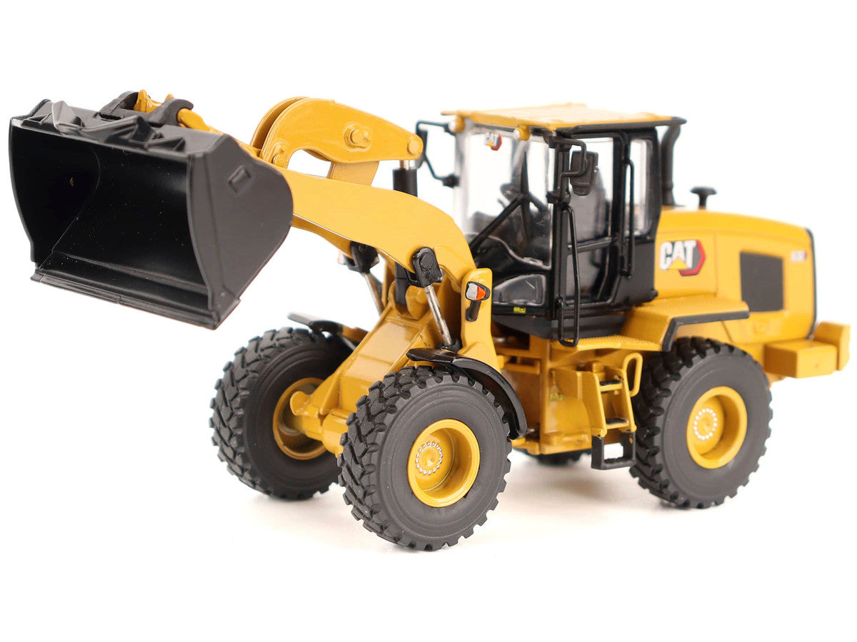 CAT Caterpillar 930 Wheel Loader with Operator Yellow "High Line" Series 1/50 Diecast Model by Diecast Masters Diecast Masters