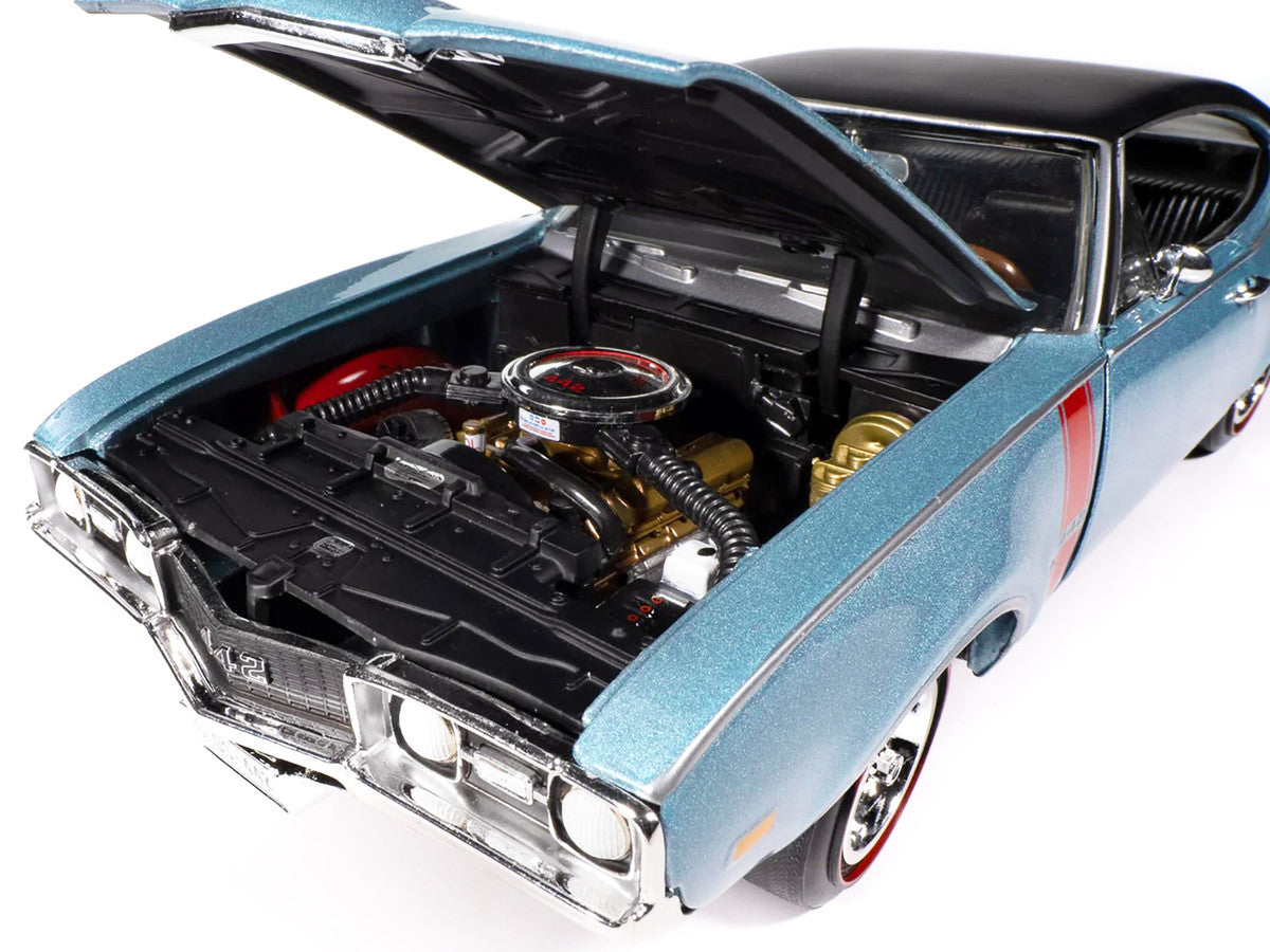 1968 Oldsmobile 442 W30 Holiday Coupe Teal Frost Metallic with Red Stripes and Black Vinyl Top "Hemmings Motor News July 2023 Cover Car" "American Muscle" Series 1/18 Diecast Model Car by Auto World Autoworld