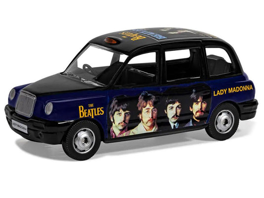 The Beatles London Taxi RHD (Right Hand Drive) "Lady Madonna" Black and Dark Blue with Graphics Diecast Model by Corgi-1