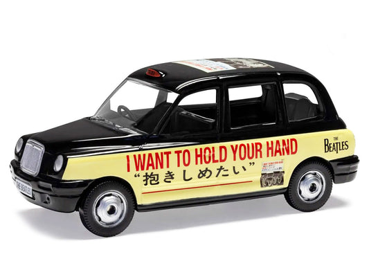 The Beatles London Taxi RHD (Right Hand Drive) "I Want To Hold Your Hand" Black and Cream with Graphics Diecast Model by Corgi-1