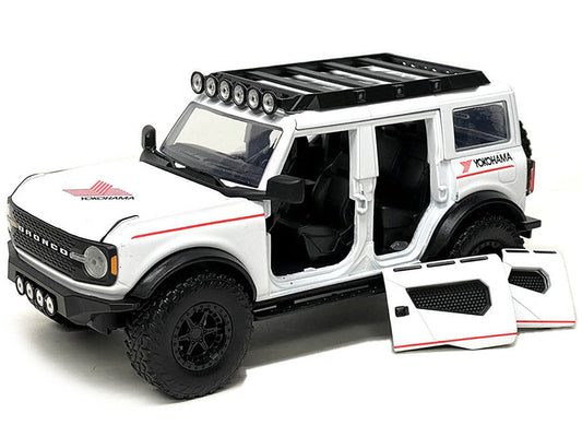 2021 Ford Bronco White with Red Stripes and Roof Rack "Yokohama Tires" "Just Trucks" Series 1/24 Diecast Model Car by Jada Jada