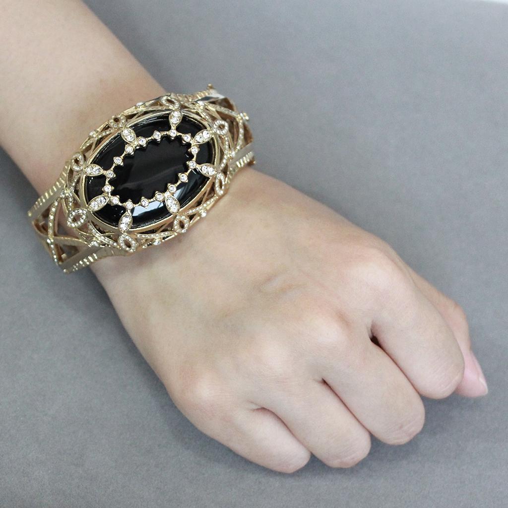 LO4349 - Gold Brass Bangle with Synthetic in Jet Alamode