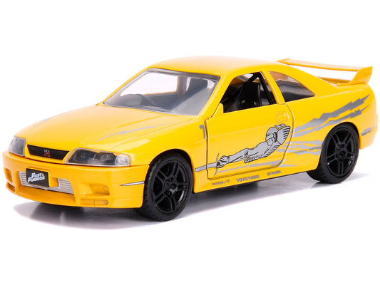 Leon's Nissan Skyline GT-R (BCNR33) Yellow Metallic with Graphics "Fast & Furious" Series 1/32 Diecast Model Car by Jada Jada