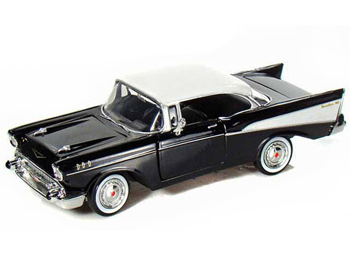 1957 Chevrolet Bel Air Black with White Top 1/24 Diecast Model Car by Motormax Motormax