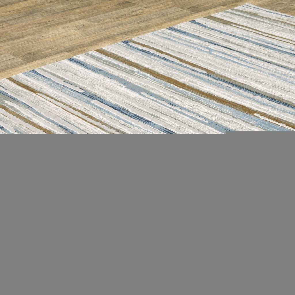 3' X 5' Grey Blue Ivory Brown Beige And Navy Abstract Power Loom Stain Resistant Area Rug