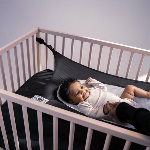 Crescent Womb™ Infant Support Device