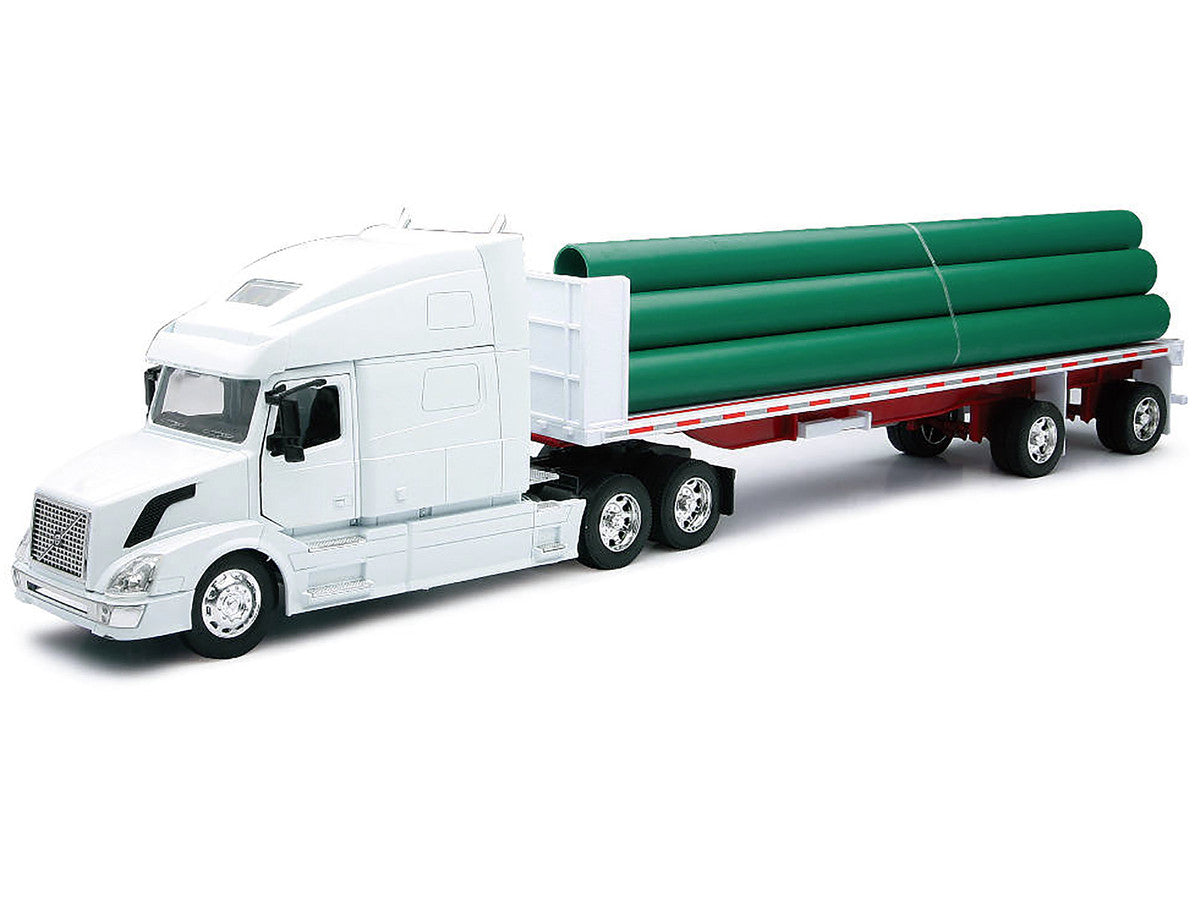 Volvo VN-780 Truck with Flatbed Trailer and Long Pipes White "Long Haul Truckers" Series 1/32 Diecast Model by New Ray New Ray