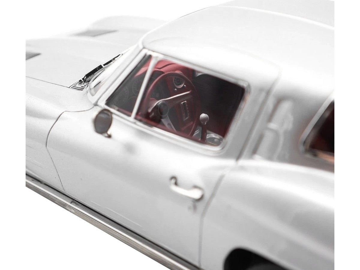 1963 Chevrolet Corvette Sting Ray Sebring Silver Metallic with Red Interior 1/18 Diecast Model Car by Norev Norev