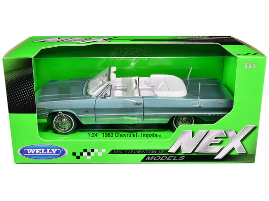 1963 Chevrolet Impala Convertible Light Blue Metallic with White Interior "NEX Models" 1/24 Diecast Model Car by Welly Welly
