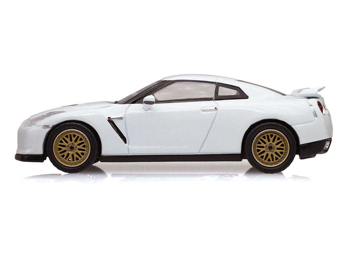 2007 Nissan GT-R (R35) Pearl White with Gold Wheels "Tokyo Torque" Series 10 1/64 Diecast Model Car by Greenlight Greenlight