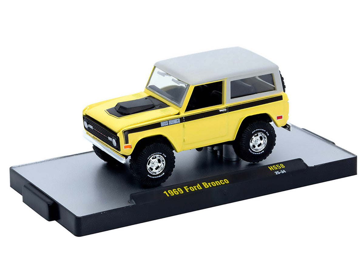 1969 Ford Bronco Yellow with Black Stripes and Gray Top Limited Edition to 6380 pieces Worldwide 1/64 Diecast Model Car by M2 Machines M2