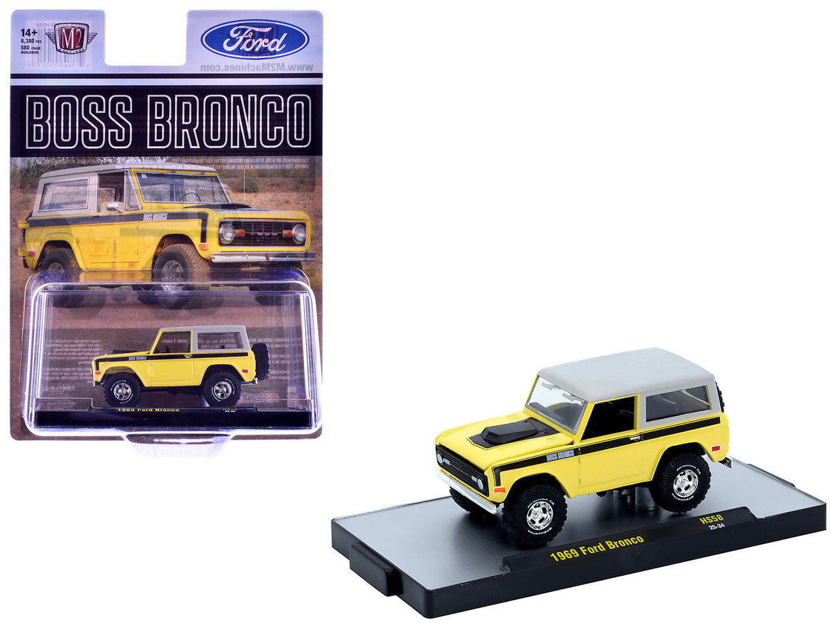 1969 Ford Bronco Yellow with Black Stripes and Gray Top Limited Edition to 6380 pieces Worldwide 1/64 Diecast Model Car by M2 Machines M2