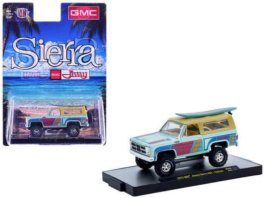 1975 GMC Jimmy Sierra 4x4 Light Blue with Graphics and Tan Top with Surfboard Limited Edition to 10560 pieces Worldwide 1/64 Diecast Model Car by M2 Machines M2