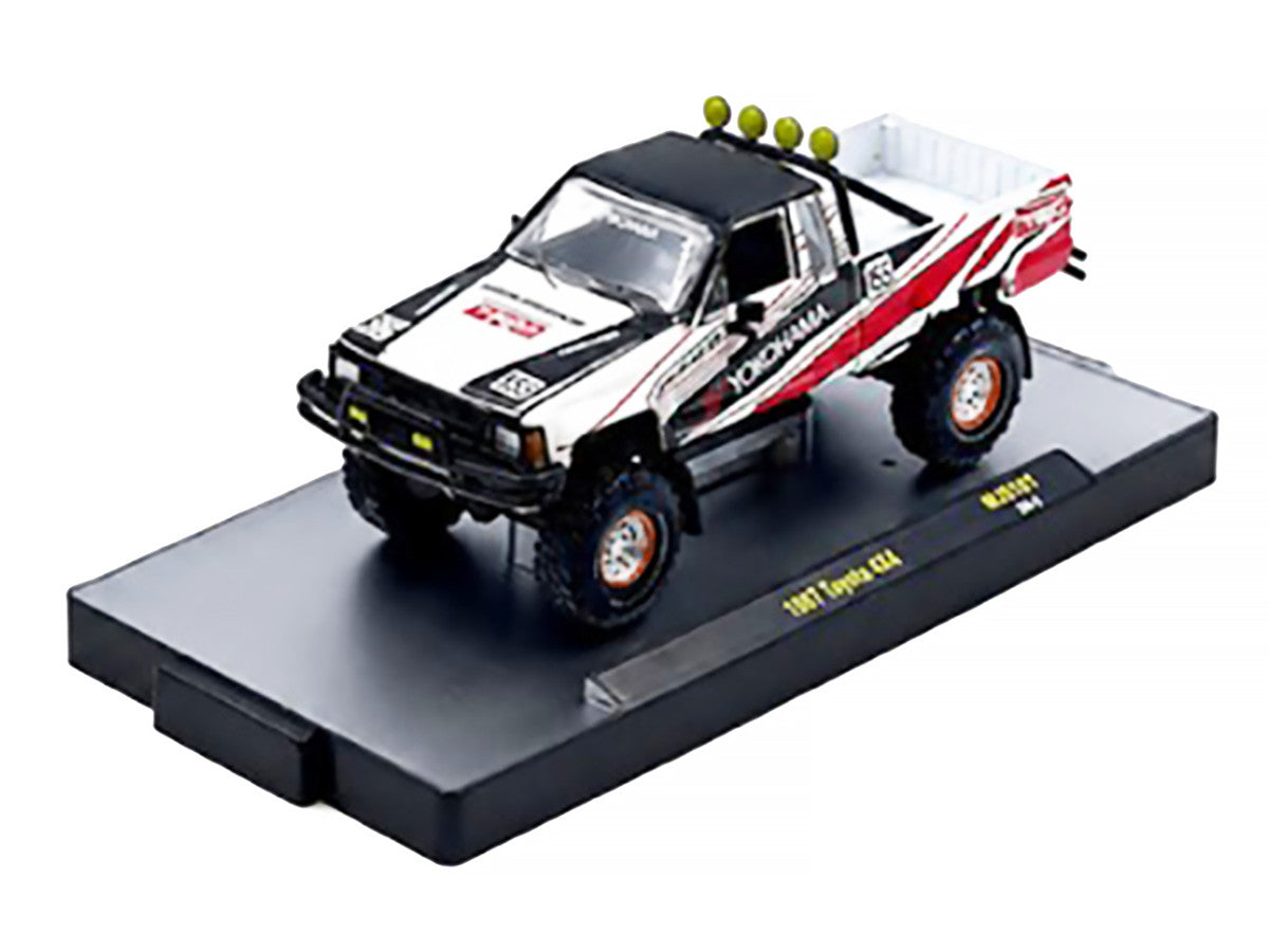 1985 Toyota SR5 4×4 Pickup Truck #85 "Yokohama" White with Black Top and Red and Black Graphics Limited Edition to 8250 pieces Worldwide 1/64 Diecast Model Car by M2 Machines M2