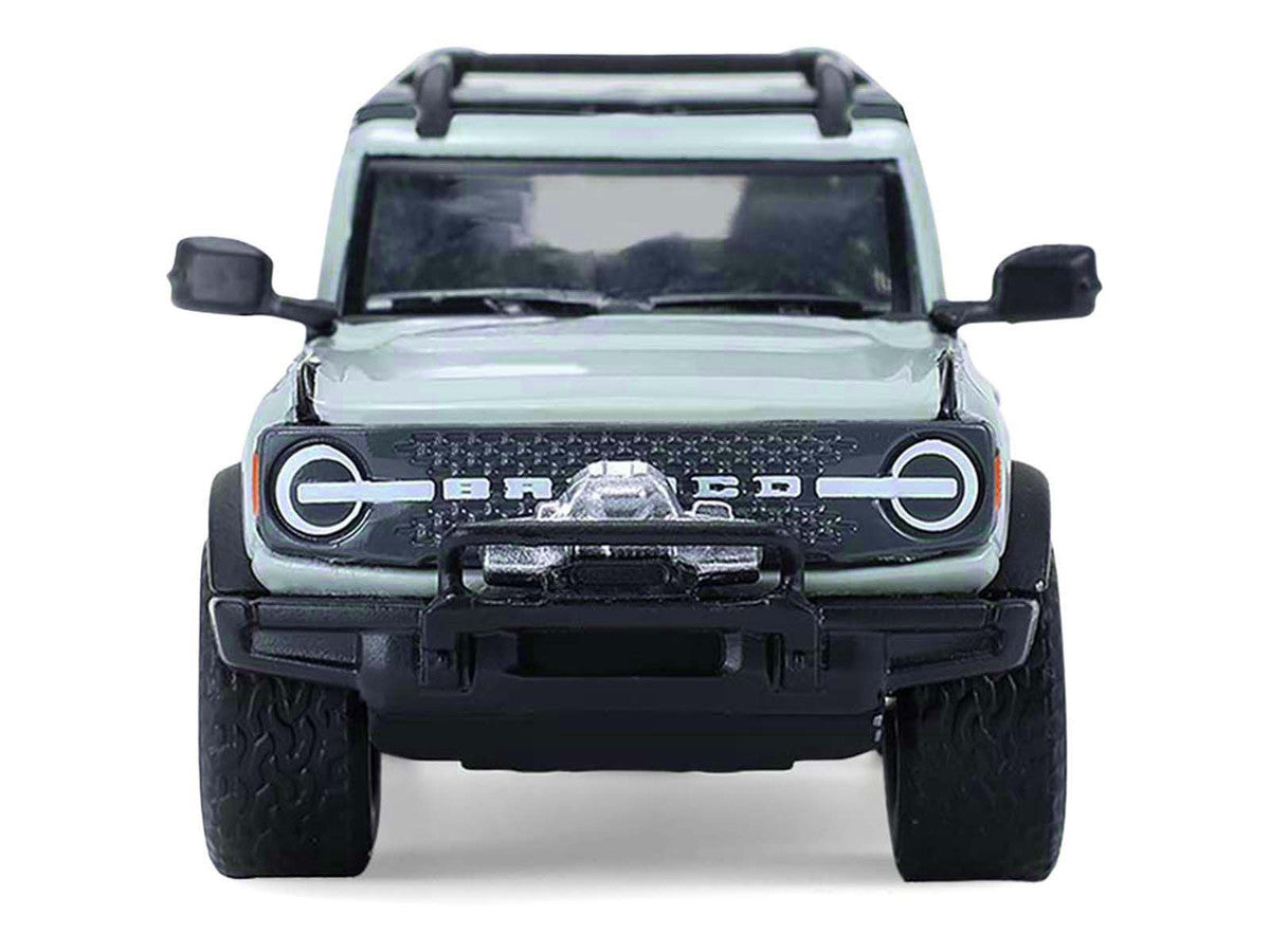 2021 Ford Bronco 4-Door Badlands Cactus Gray with Black Top and Motorcycle with Utility Trailer "Hitch & Tow" Series 33 1/64 Diecast Model Cars by Greenlight Greenlight