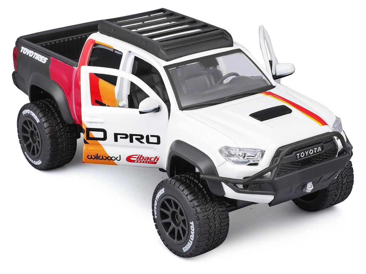 2023 Toyota Tacoma TRD PRO Off Road Pickup Truck White with Graphics and Roof Rack "Maisto Design" Series 1/27 Diecast Model Car Maisto Maisto