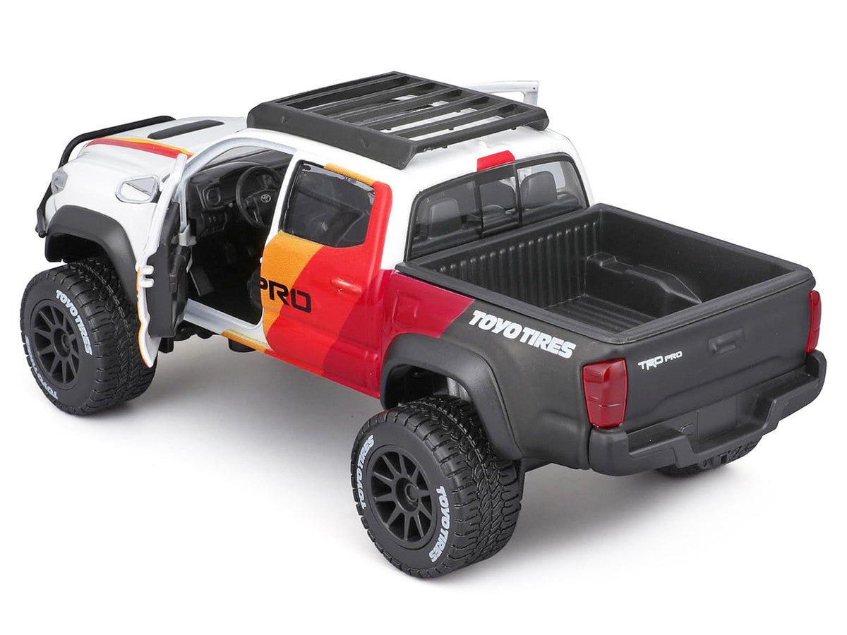 2023 Toyota Tacoma TRD PRO Off Road Pickup Truck White with Graphics and Roof Rack "Maisto Design" Series 1/27 Diecast Model Car Maisto Maisto