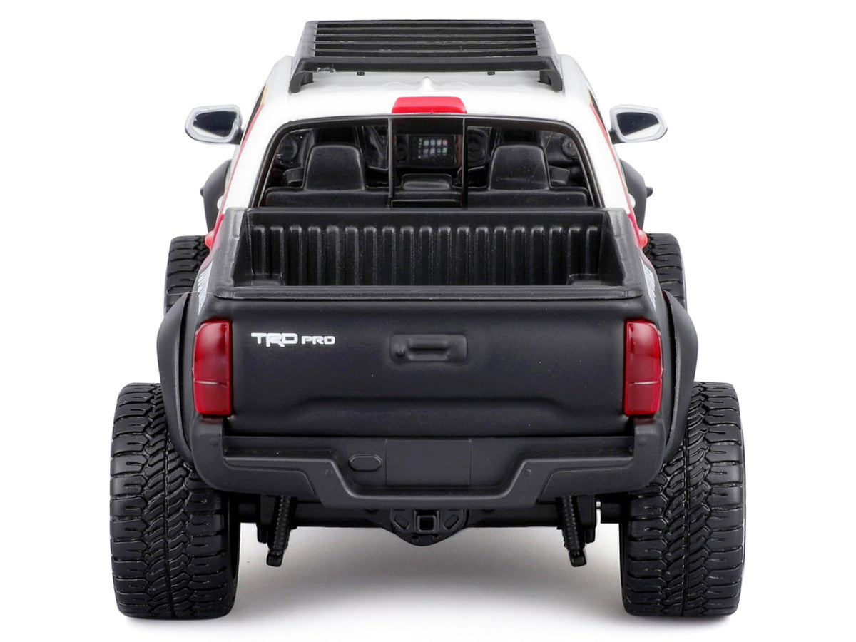 2023 Toyota Tacoma TRD PRO Off Road Pickup Truck White with Graphics and Roof Rack "Maisto Design" Series 1/27 Diecast Model Car Maisto Maisto