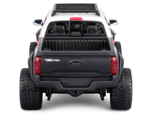 2023 Toyota Tacoma TRD PRO Off Road Pickup Truck White with Graphics and Roof Rack "Maisto Design" Series 1/27 Diecast Model Car Maisto Maisto
