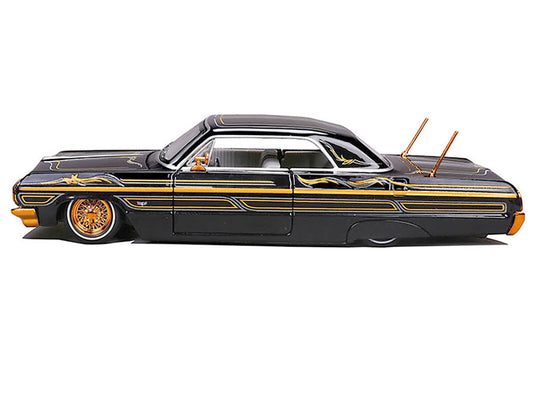 1964 Chevrolet Impala SS Lowrider Black Metallic with Gold Graphics and Gray Interior "Lowriders" "Maisto Design" Series 1/26 Diecast Model Car by Maisto Maisto