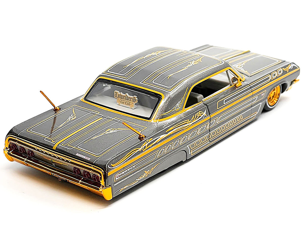 1964 Chevrolet Impala SS Lowrider Gray Metallic with Gold Graphics "Lowriders" "Maisto Design" Series 1/26 Diecast Model Car by Maisto Maisto