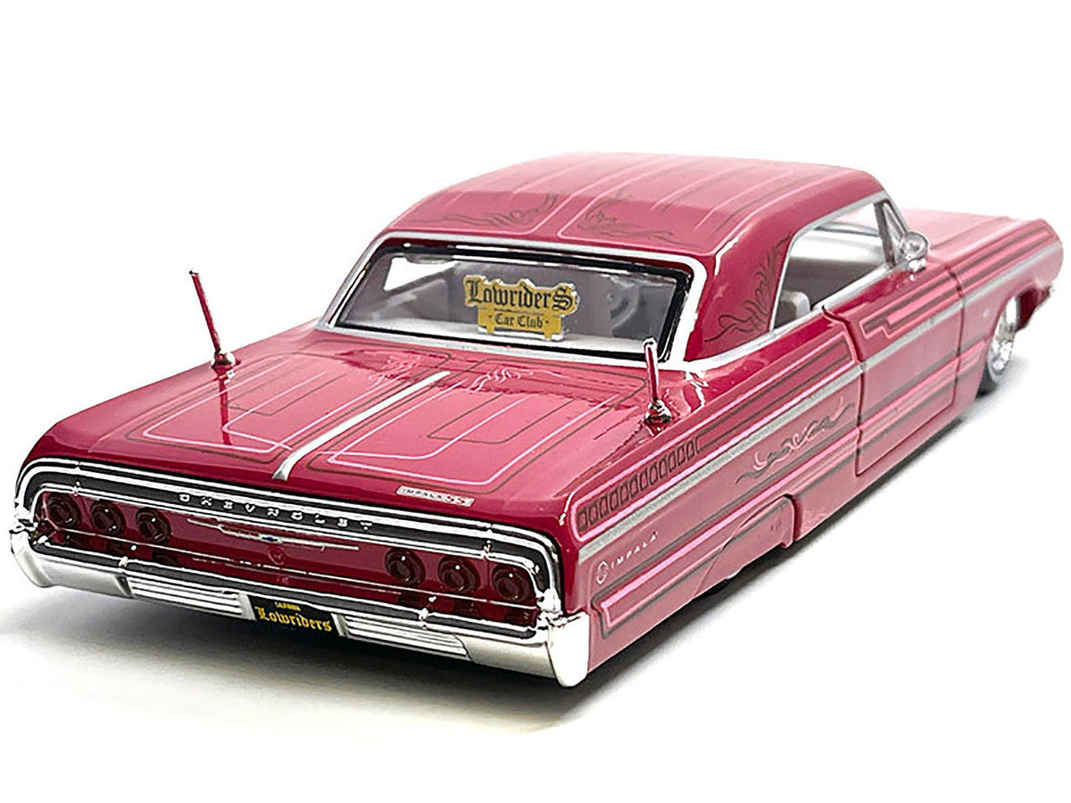 1964 Chevrolet Impala SS Lowrider Pink with Graphics and White Interior "Lowriders" "Maisto Design" Series 1/26 Diecast Model Car by Maisto Maisto