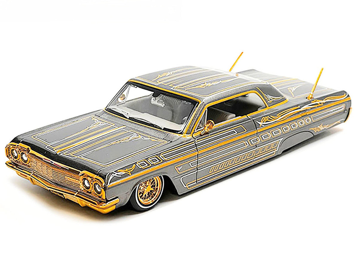 1964 Chevrolet Impala SS Lowrider Gray Metallic with Gold Graphics "Lowriders" "Maisto Design" Series 1/26 Diecast Model Car by Maisto Maisto