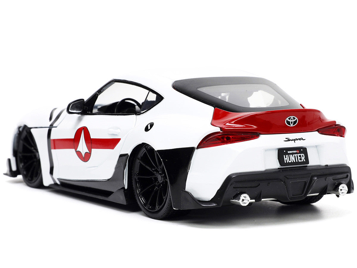 2020 Toyota Supra White and Rick Hunter Diecast Figurine "Robotech" "Hollywood Rides" Series 1/24 Diecast Model Car by Jada Jada