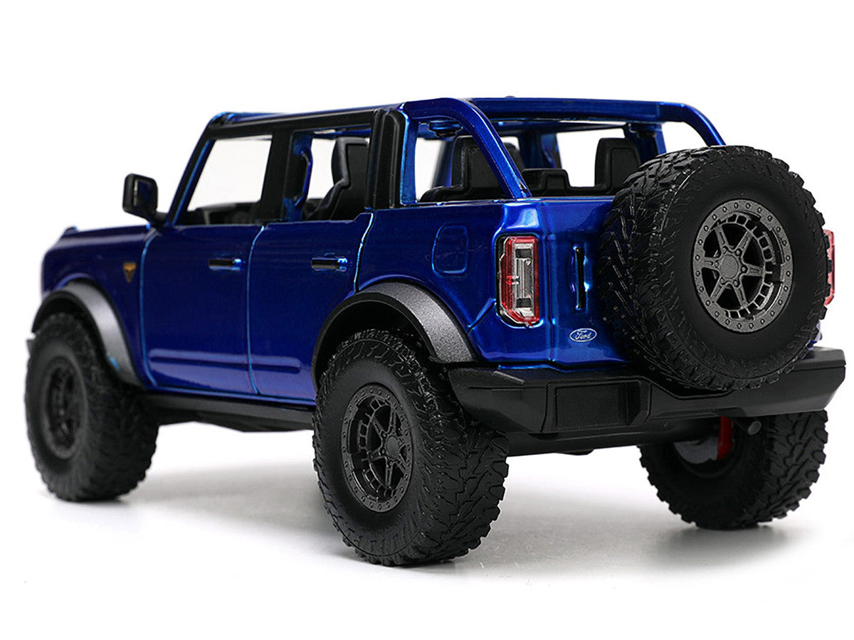 2021 Ford Bronco Open-Top Candy Blue Metallic with Extra Wheels "Just Trucks" Series 1/24 Diecast Model Car by Jada Jada
