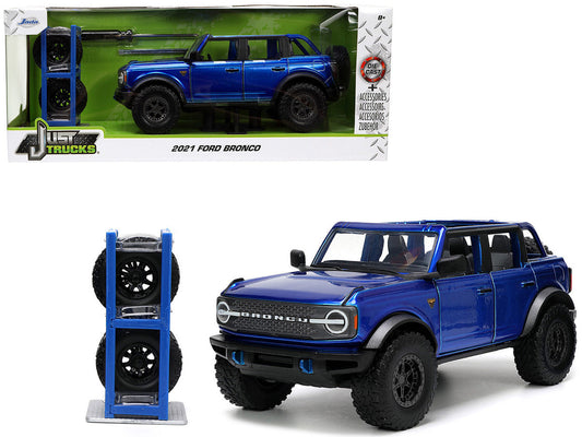 2021 Ford Bronco Open-Top Candy Blue Metallic with Extra Wheels "Just Trucks" Series 1/24 Diecast Model Car by Jada Jada