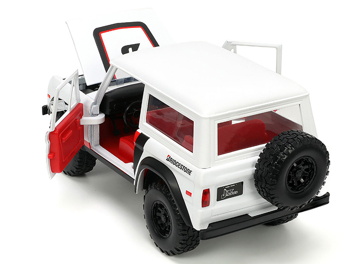 1973 Ford Bronco #008 White with Red and Black Stripes and Red Interior with Extra Wheels "Just Trucks" Series 1/24 Diecast Model Car by Jada Jada