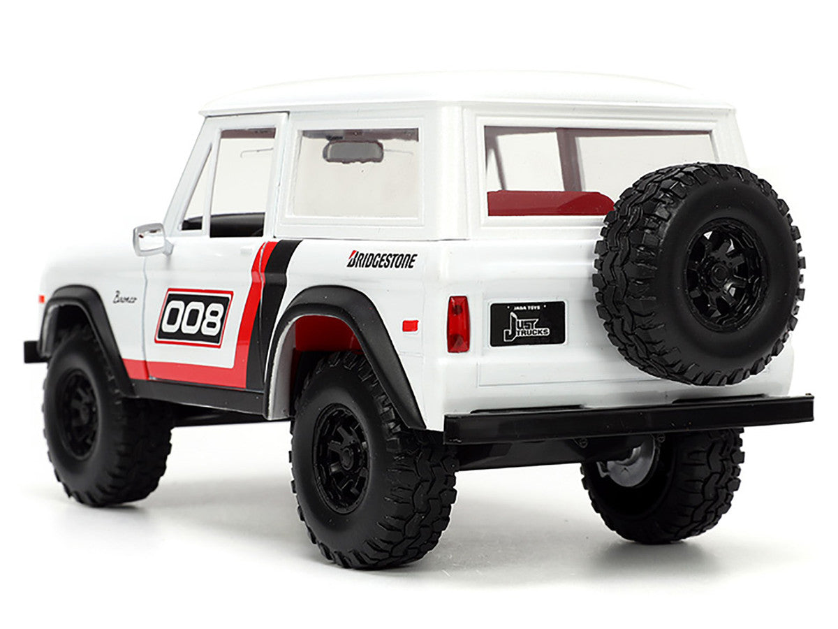 1973 Ford Bronco #008 White with Red and Black Stripes and Red Interior with Extra Wheels "Just Trucks" Series 1/24 Diecast Model Car by Jada Jada