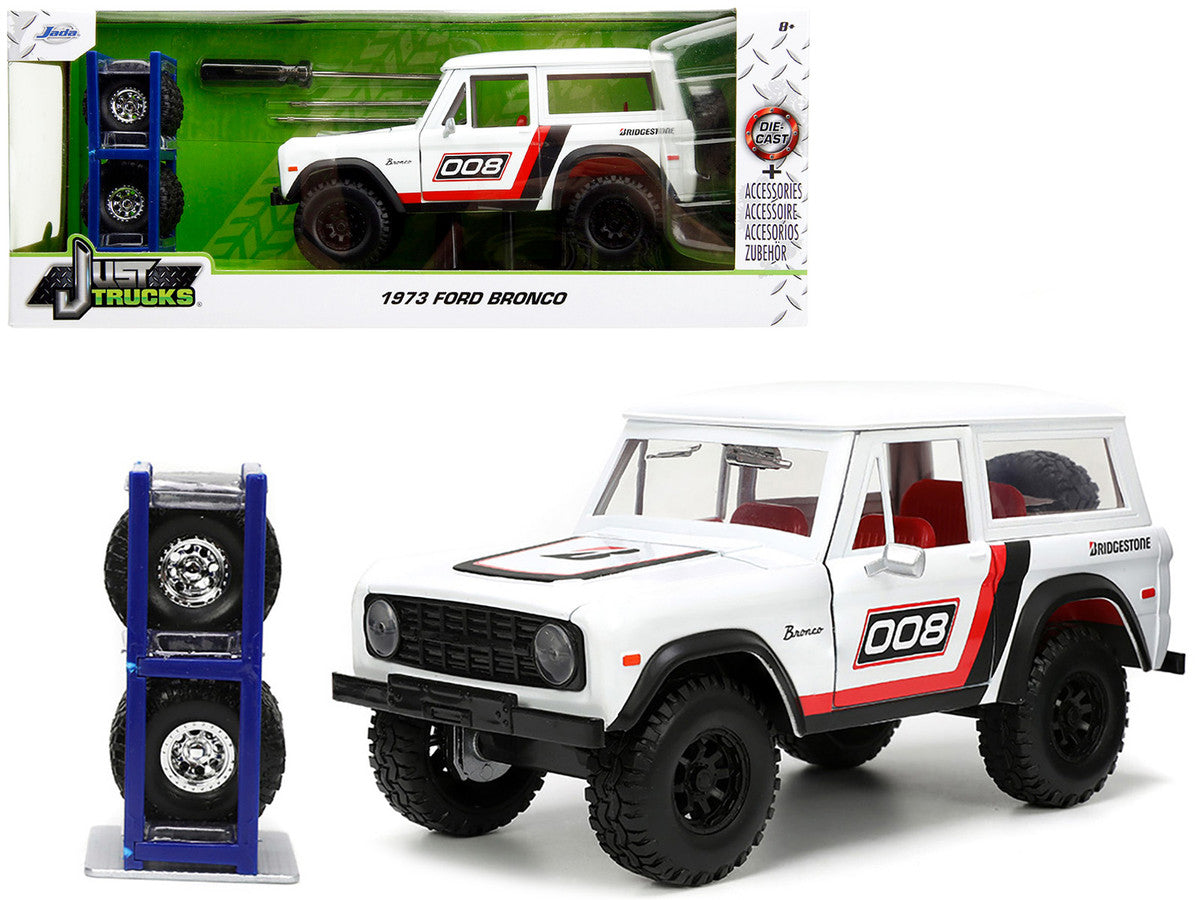 1973 Ford Bronco #008 White with Red and Black Stripes and Red Interior with Extra Wheels "Just Trucks" Series 1/24 Diecast Model Car by Jada Jada