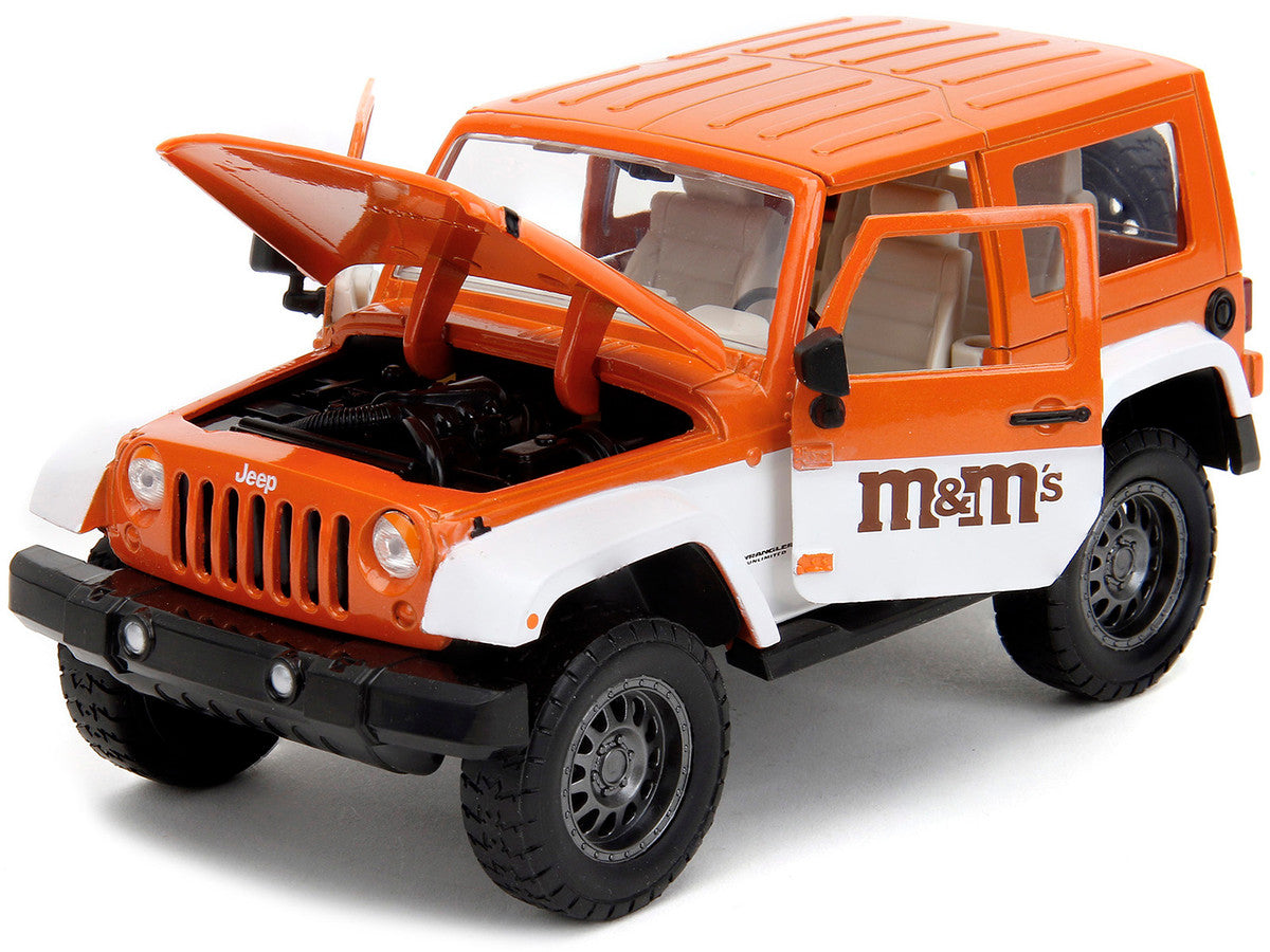 2007 Jeep Wrangler Orange Metallic and White and Orange M&M Diecast Figure "M&M's" "Hollywood Rides" Series 1/24 Diecast Model Car by Jada Jada