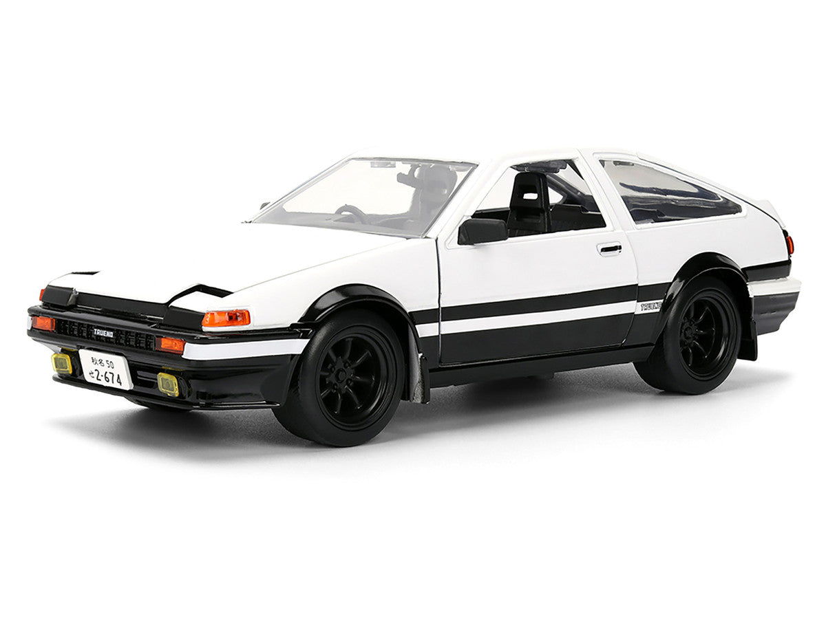 Toyota Trueno (AE86) RHD (Right Hand Drive) White and Black with Graphics and Takumi Diecast Figure "Initial D" (1998-2021) TV Series "Anime Hollywood Rides" Series 1/24 Diecast Model by Jada Jada