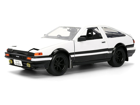 Toyota Trueno (AE86) RHD (Right Hand Drive) White and Black with Graphics and Takumi Diecast Figure "Initial D" (1998-2021) TV Series "Anime Hollywood Rides" Series 1/24 Diecast Model by Jada Jada