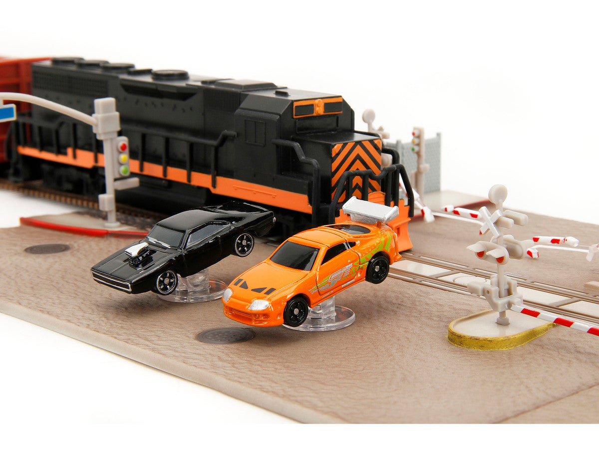 "Fast & Furious" Final Race Diorama with Toyota Supra Orange and Dodge Charger Black "Nano Scene" Series model by Jada Jada