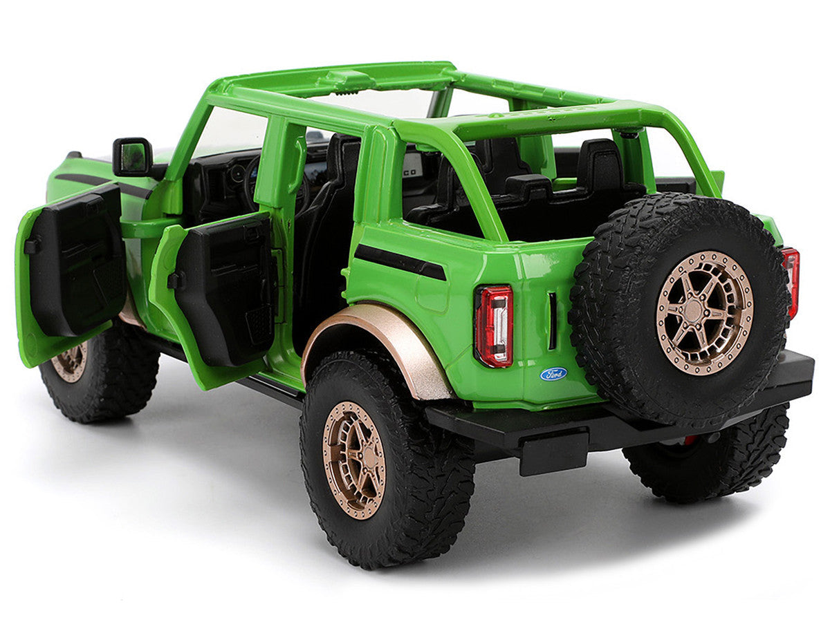 2021 Ford Bronco Green with Black Stripes and Green M&M's Diecast Figure "Hollywood Rides" Series 1/24 Diecast Model Car by Jada Jada