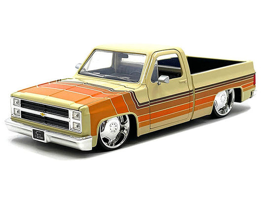 1985 Chevrolet C-10 Pickup Truck Beige with Stripes and Lowenhart Wheels "Just Trucks" Series 1/24 Diecast Model Car by Jada Jada
