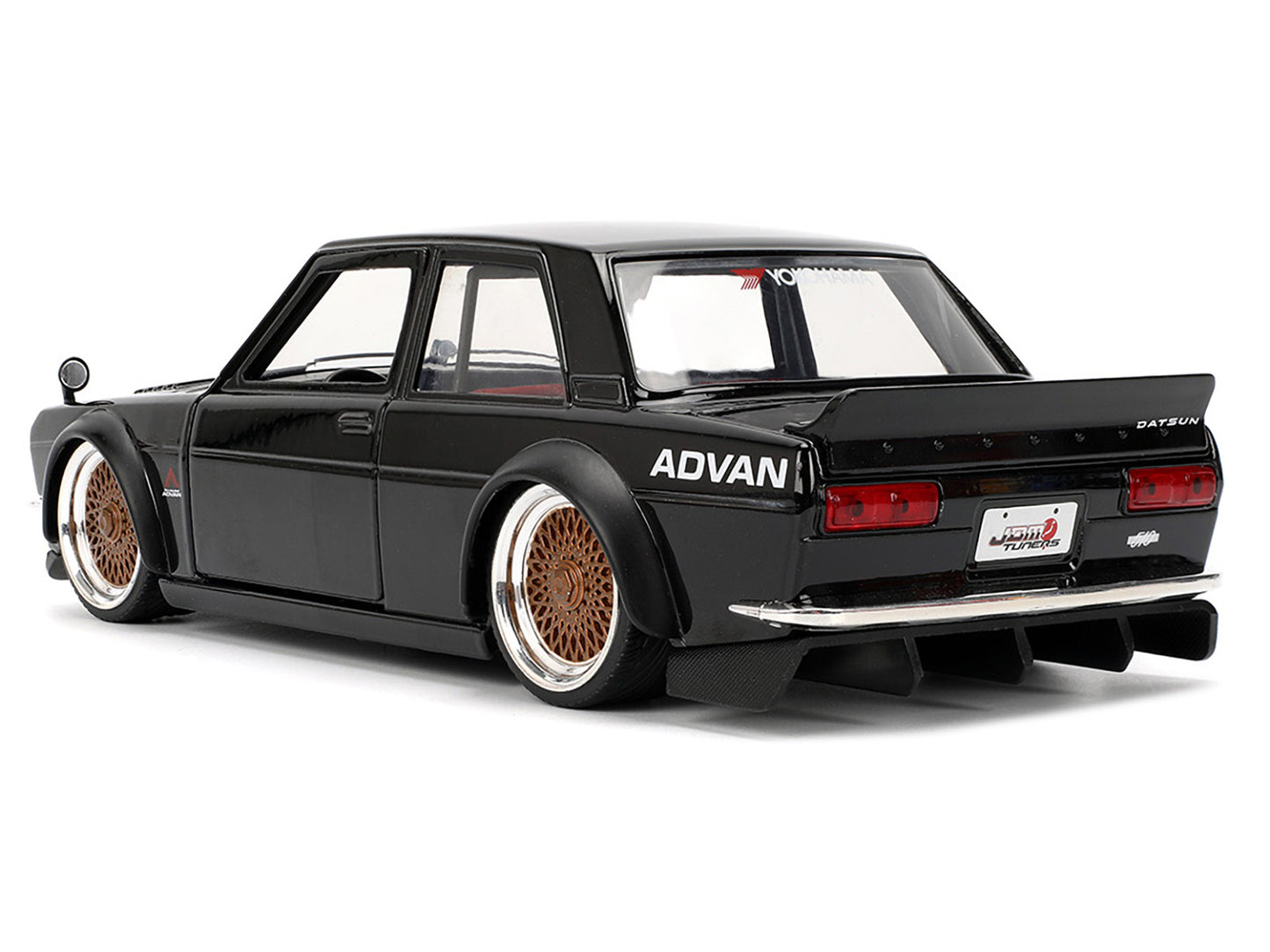 1973 Datsun 510 Black with Gold Wheels "JDM Tuners" Series 1/24 Diecast Model Car by Jada