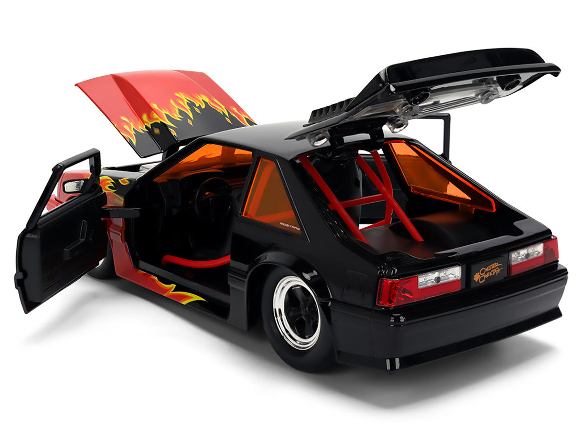 1989 Ford Mustang GT Black with Red Flame Graphics and Chester Cheetah Diecast Figure "Cheetos Flamin' Hot" "Hollywood Rides" Series 1/24 Diecast Model Car by Jada Jada