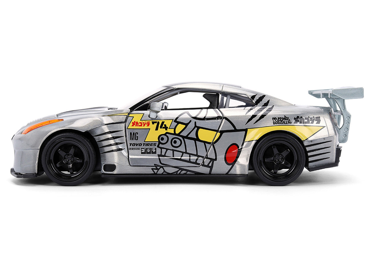 2009 Nissan GT-R (R35) Ben Sopra Brushed Metal with Black Top and Graphics and Mechagodzilla Diecast Figure "Godzilla" Franchise "Anime Hollywood Rides" Series 1/24 Diecast Model by Jada Jada
