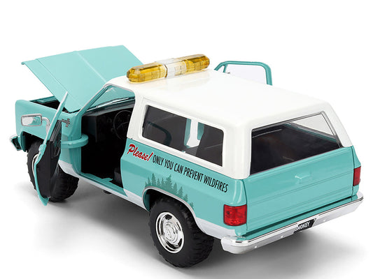 1980 Chevrolet Blazer Light Green with White Top and Graphics and Smokey Bear Diecast Figure "Smokey Bear" "Hollywood Rides" Series 1/24 Diecast Model by Jada Jada
