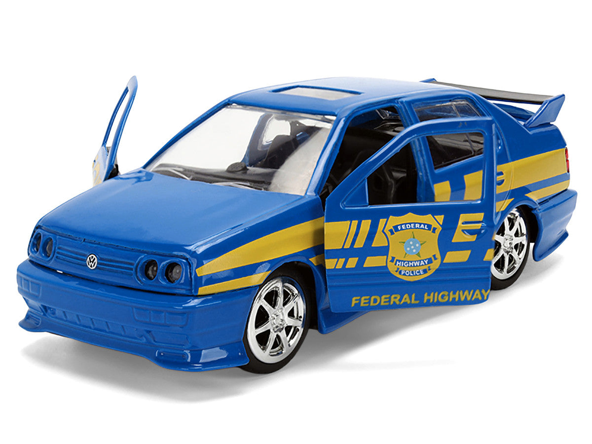 Volkswagen Jetta Police Vehicle "Rio Federal Highway Police" Blue with Yellow Stripes "Fast Five" (2011) Movie "Fast & Furious" Series 1/32 Diecast Model Car by Jada Jada
